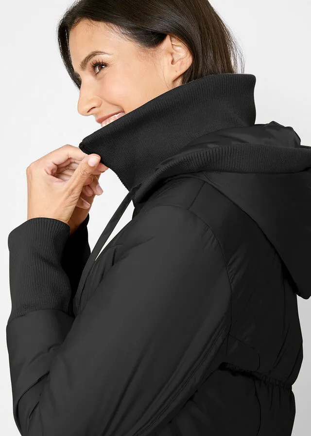 Abrigo acolchado con cinturilla cómoda ancha y capucha Negro