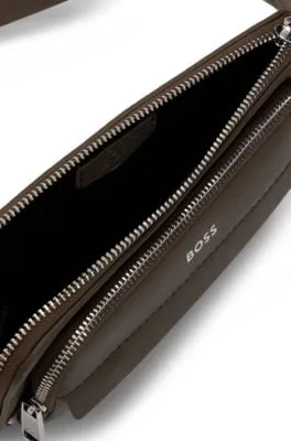 Bolso cruzado con estructura y ribetes de la marca