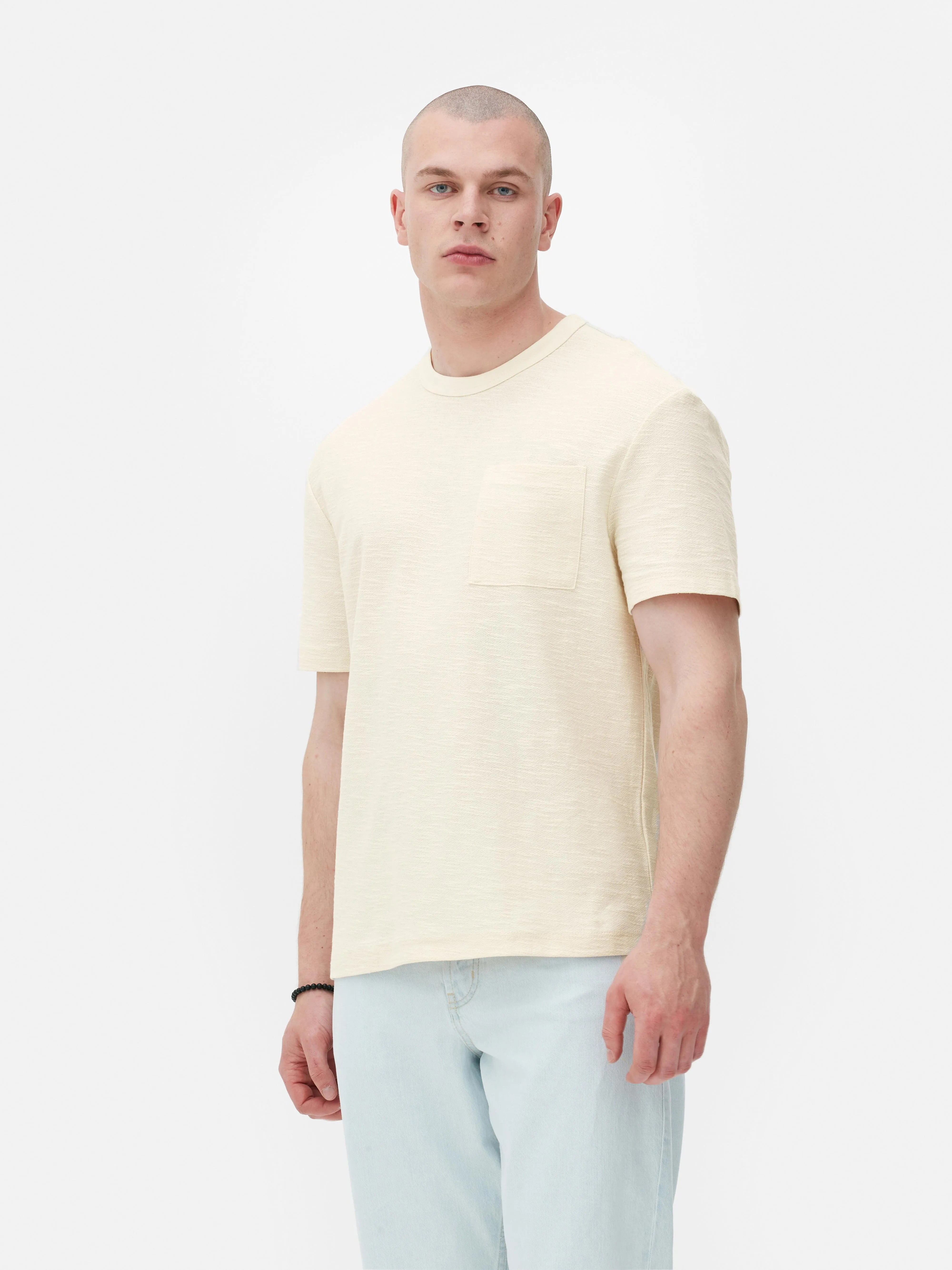 Camiseta de crepé con bolsillo de plastrón