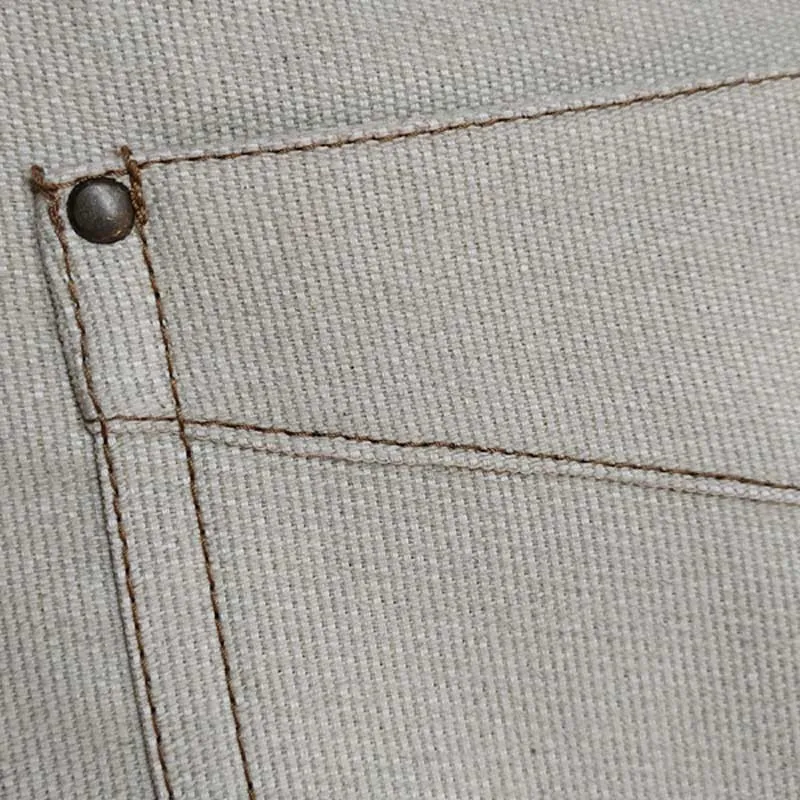 DELANTAL ECO BEIGE CON PETO Y MOSQUETóN  DYNEKE