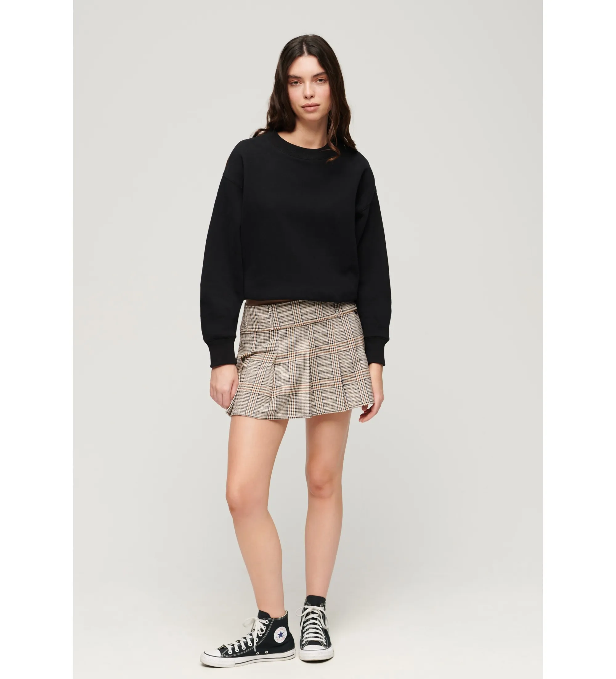 Minifalda plisada de talle bajo beige