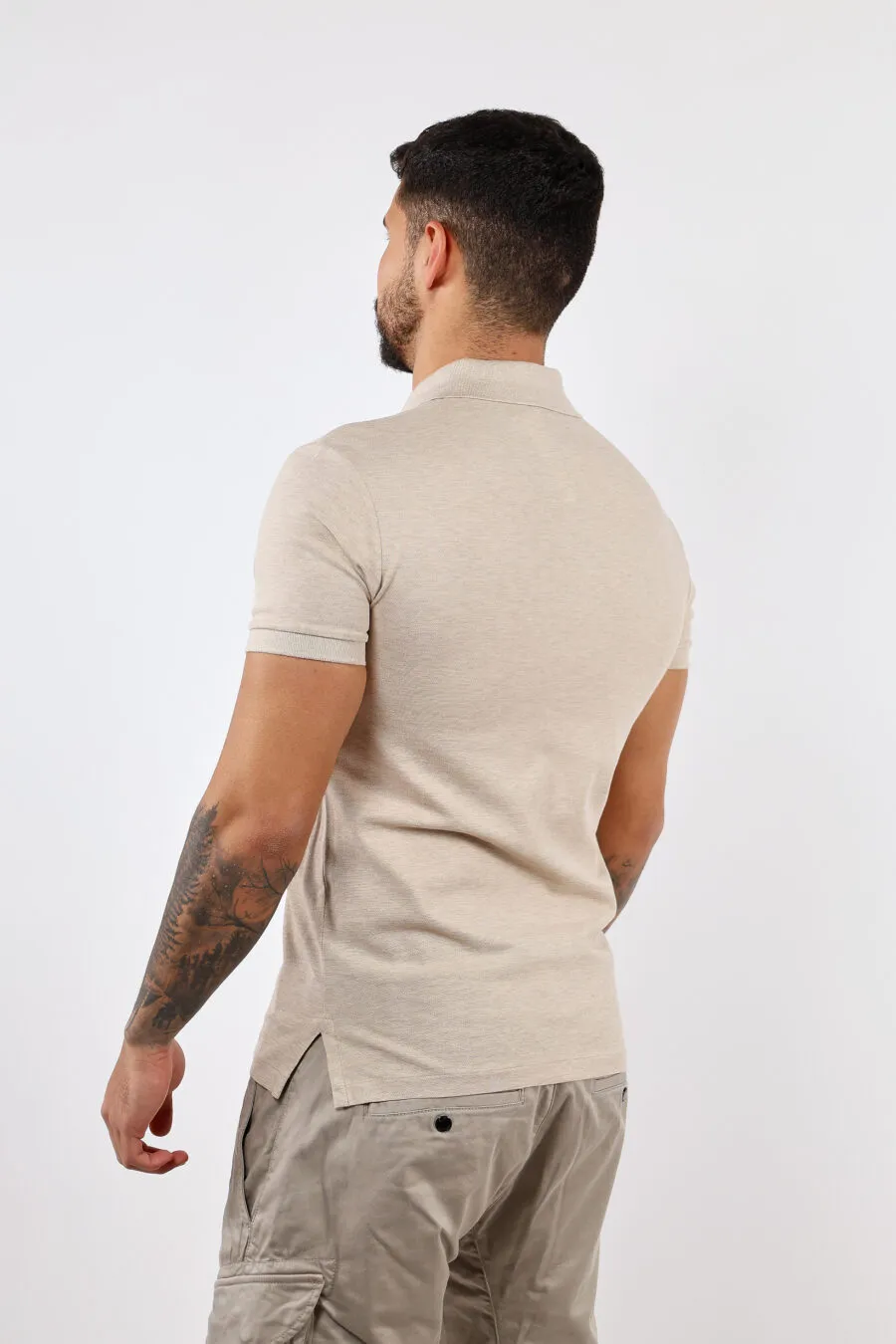 Polo beige con minilogo 
